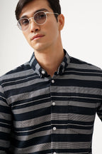 NOIELINE striped shirt with black and grey pattern, crafted from breathable cotton for comfort and style.