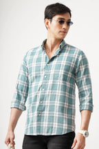 BRUMIX CHECK SHIRT in checkered pattern worn by a man, showcasing comfort fit and style.