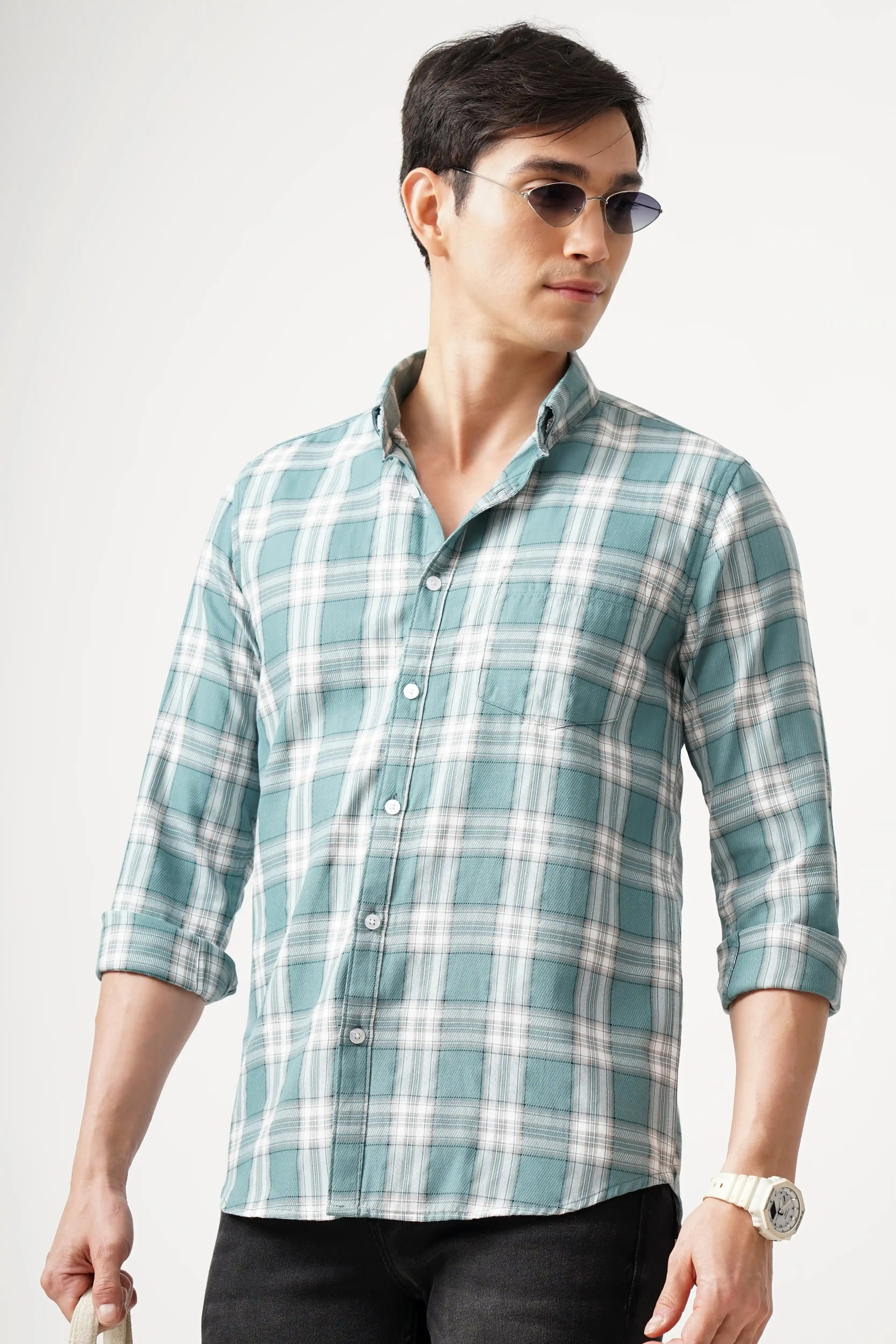 BRUMIX CHECK SHIRT in checkered pattern worn by a man, showcasing comfort fit and style.