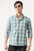 Man wearing BRUMIX CHECK SHIRT with comfort fit and stylish checkered pattern.