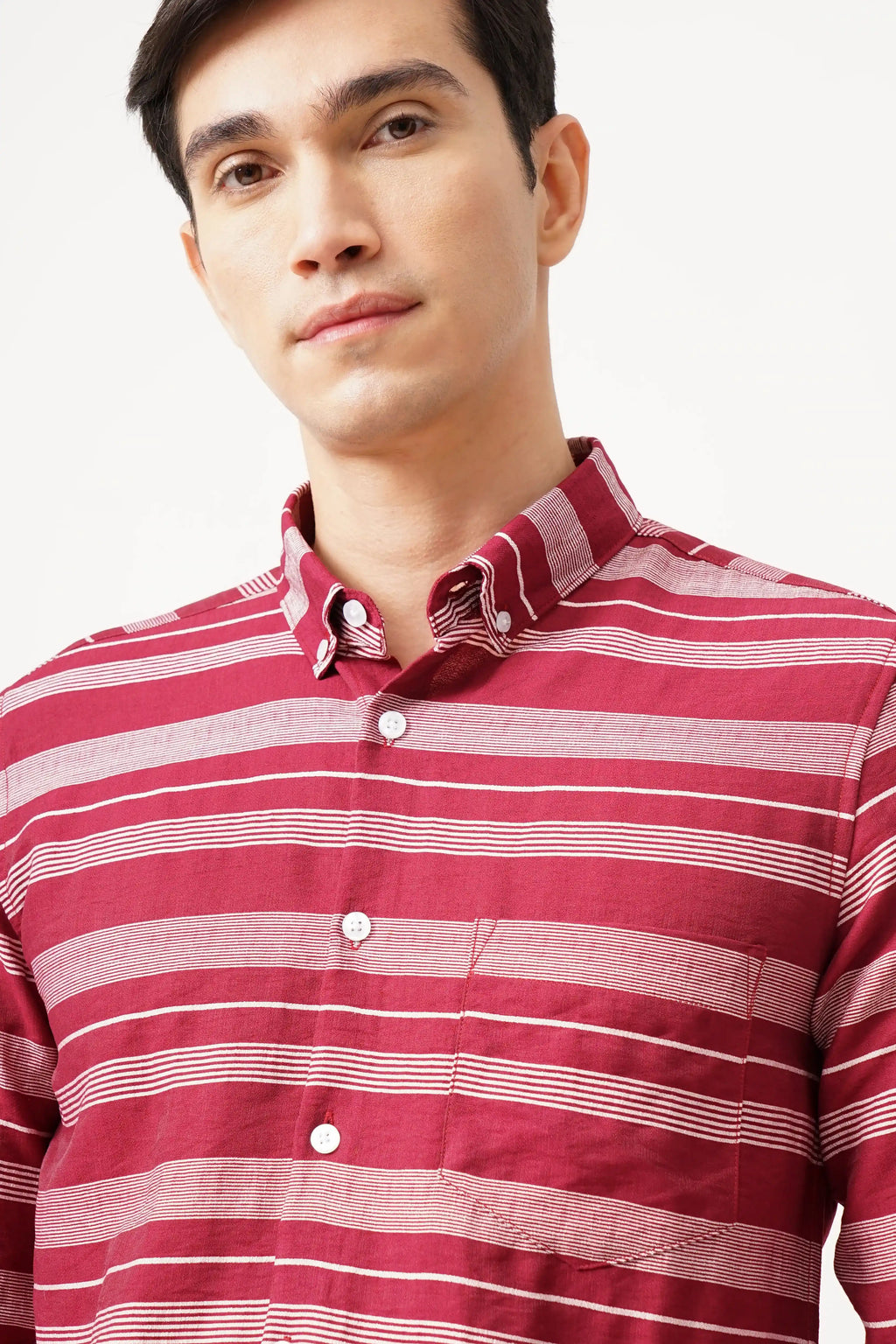 Striped red cotton shirt with bold pattern and comfortable fit.