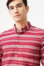 Striped red cotton shirt with bold pattern and comfortable fit.