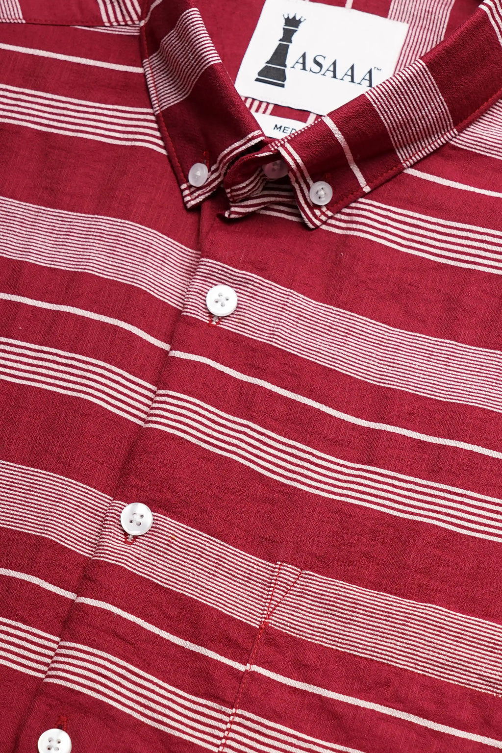 Bold striped red cotton shirt with white lines, featuring a button-down collar.