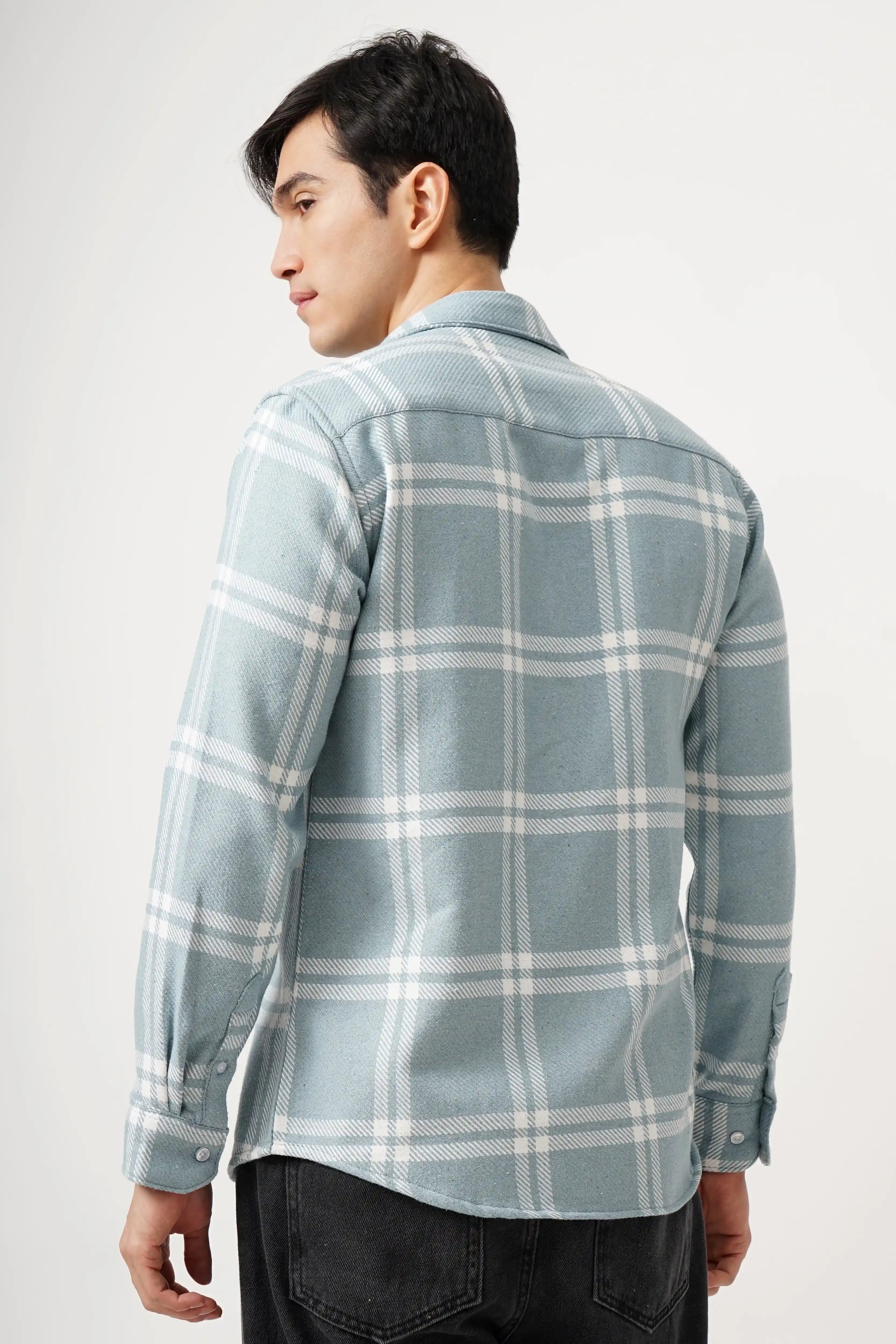 Man wearing GRIDLUX BRUSH CHECK SHIRT in a comfort fit with a classic check pattern.