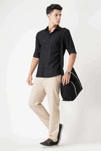 Black striped shirt for men, 100% cotton, elegant design.