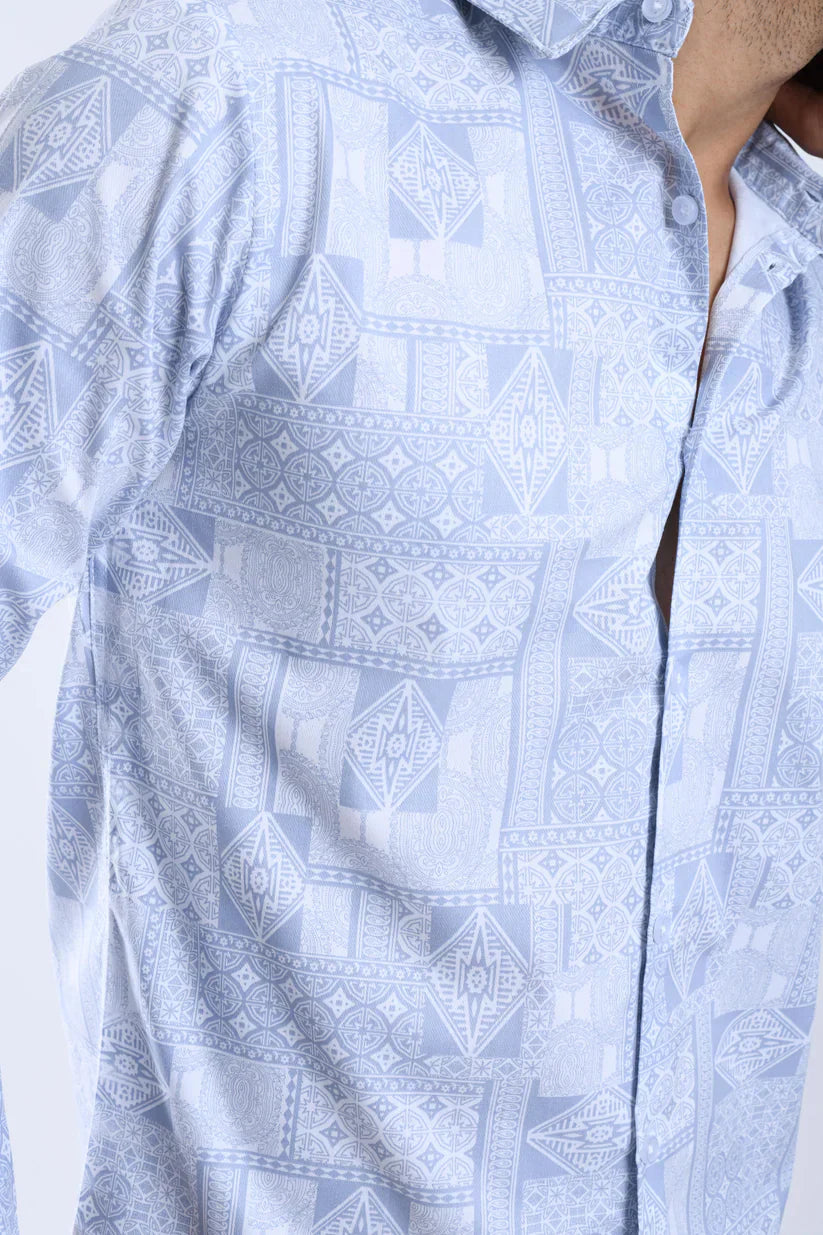 Blue geometric pattern shirt made of cotton blend lycra fabric.