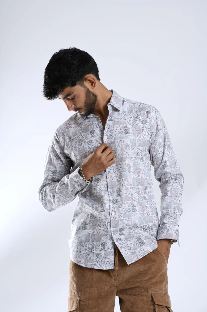 Man wearing Coral Garden shirt with stylish print and comfortable fit.