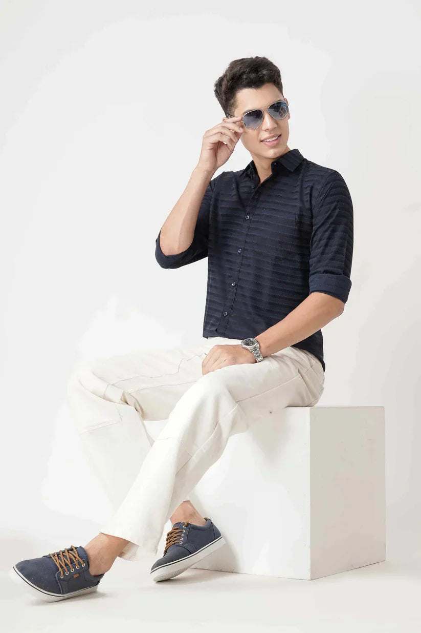 Navy blue striped shirt for men made with cotton blend fabric.