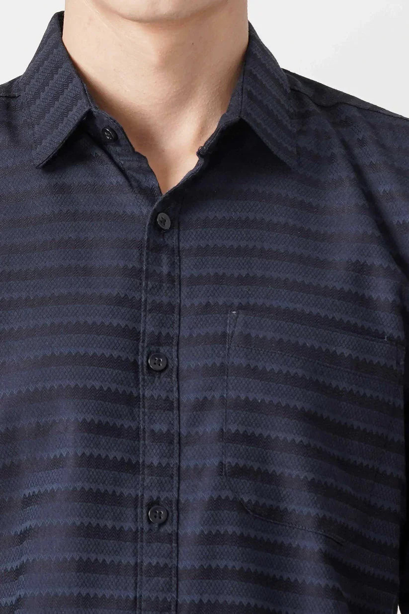 Navy blue striped shirt made with cotton blend fabric for men.