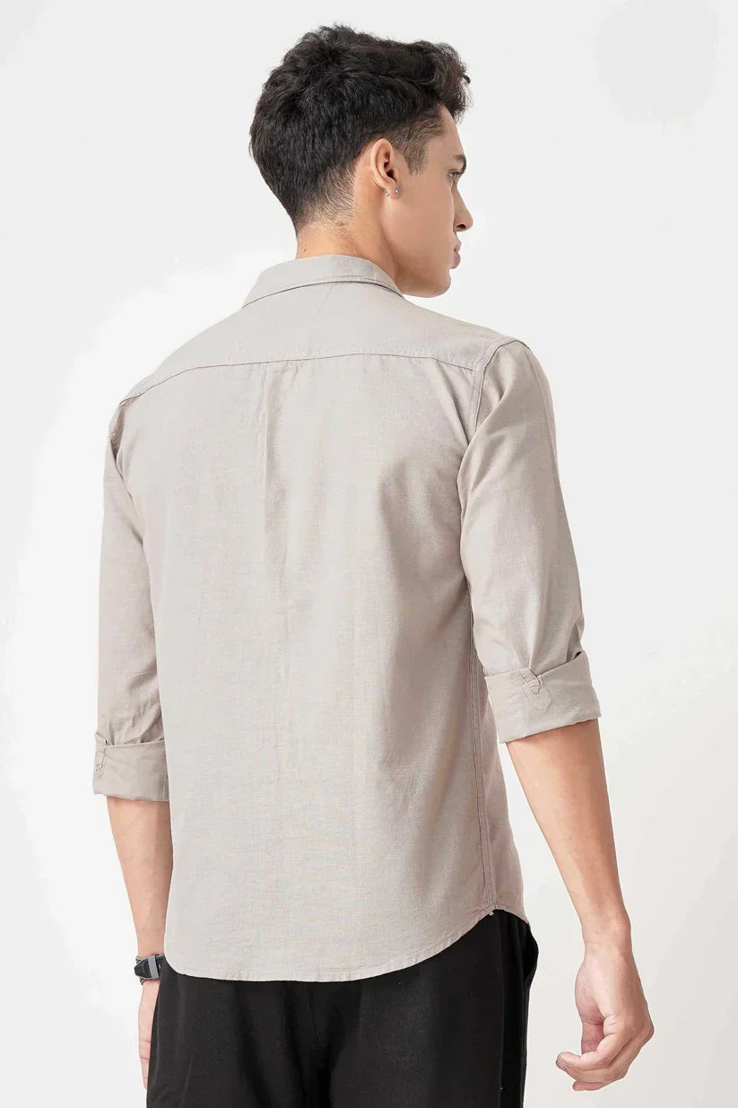 Beige linen shirt viewed from the back.