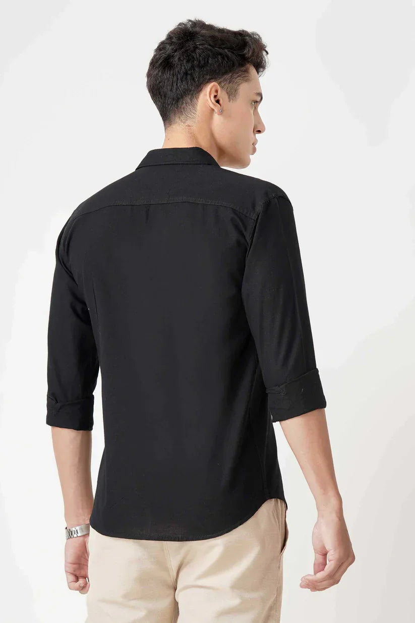 Black linen shirt made from pure fabric, showcasing elegant style for any occasion.