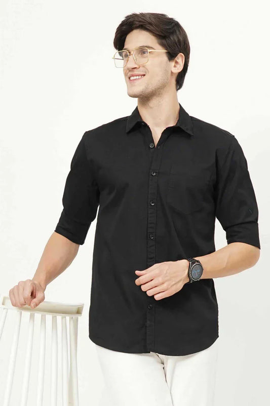 Black plain shirt for men made from 100% cotton fabric.