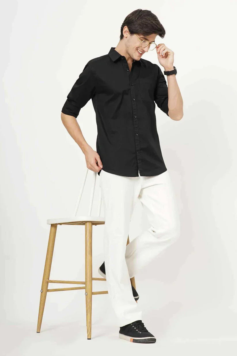 Black plain shirt for men made from 100% cotton fabric.