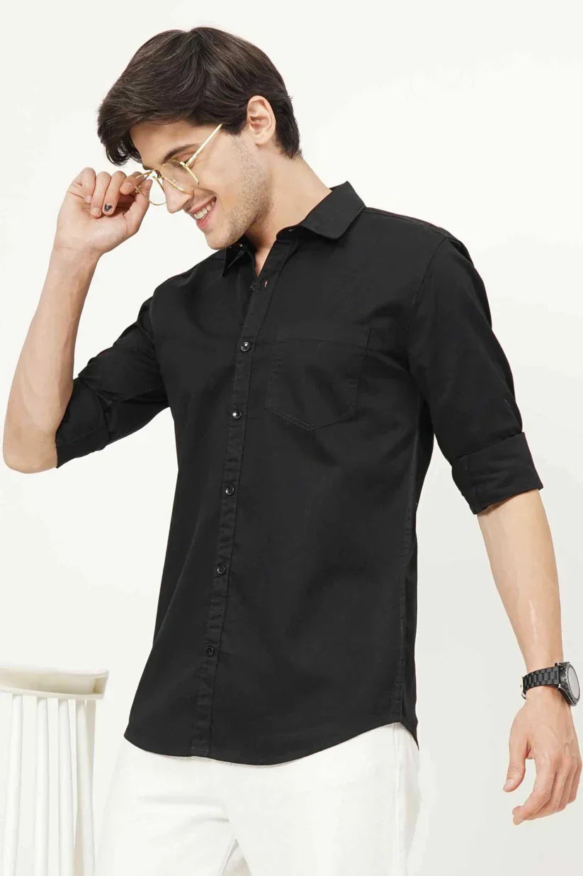 Men's black plain shirt made from 100% cotton fabric.