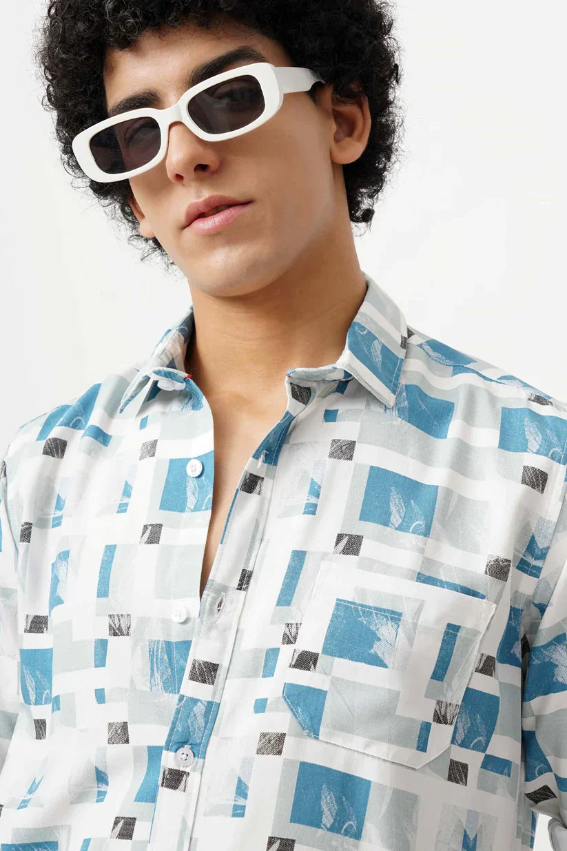 Stylish blue azure canvas shirt for men with geometric design.