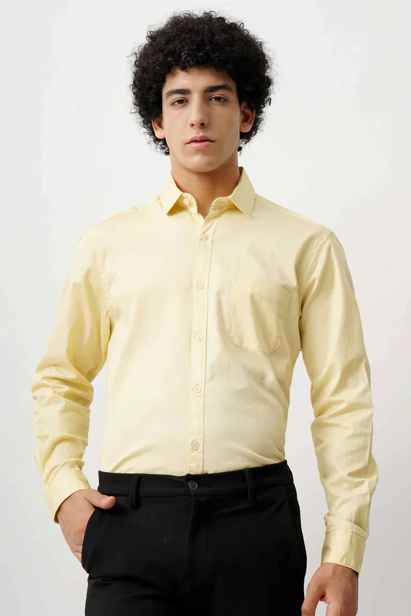 Man wearing a lime minimalist shirt made of 100% cotton.