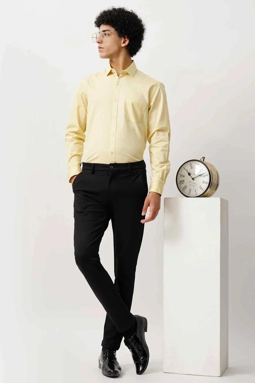 Man wearing lime minimalist shirt made of 100% cotton.