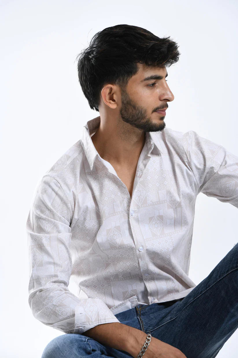 Man wearing a stylish peach blossom printed lycra shirt with jeans.