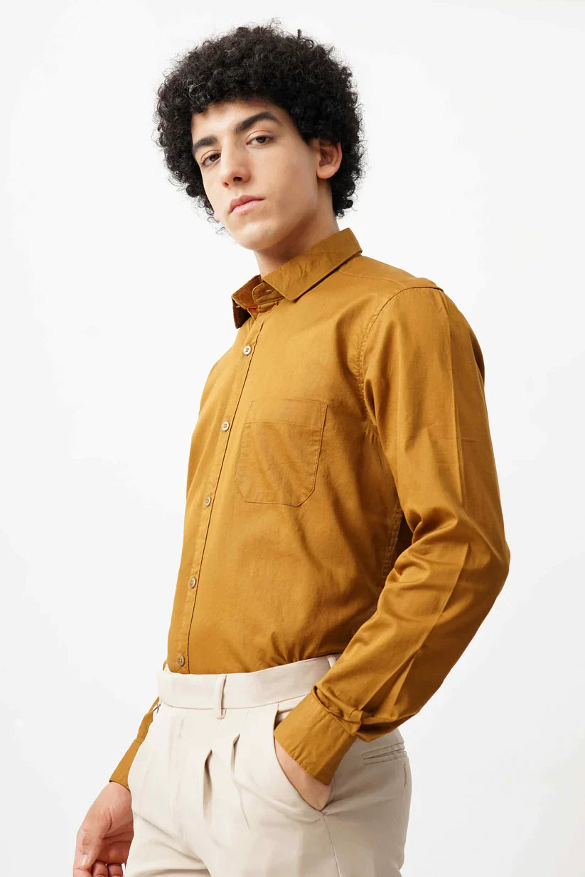 Men's tan minimalist shirt made with 100% cotton, classic brown style.