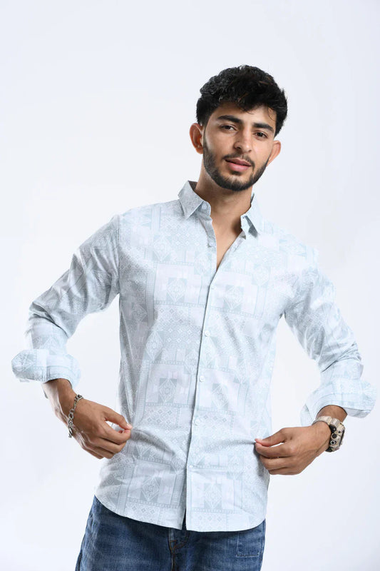 Man wearing water green printed shirt made of 100% cotton.