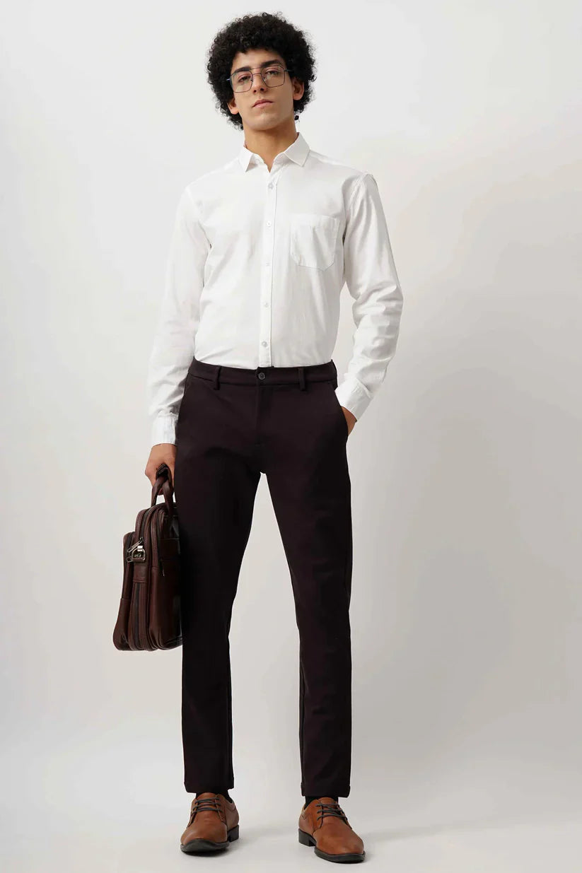 White minimalist shirt for men made with 100% cotton fabric.